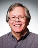 Portrait of Editorial Board member John M.  Budd 